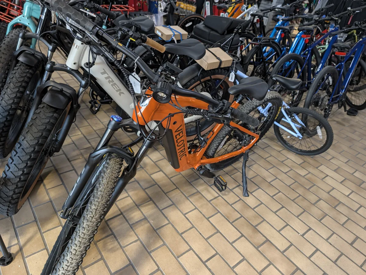 Velotric and Trek e-bikes on the sales floor at All Seasons Sports